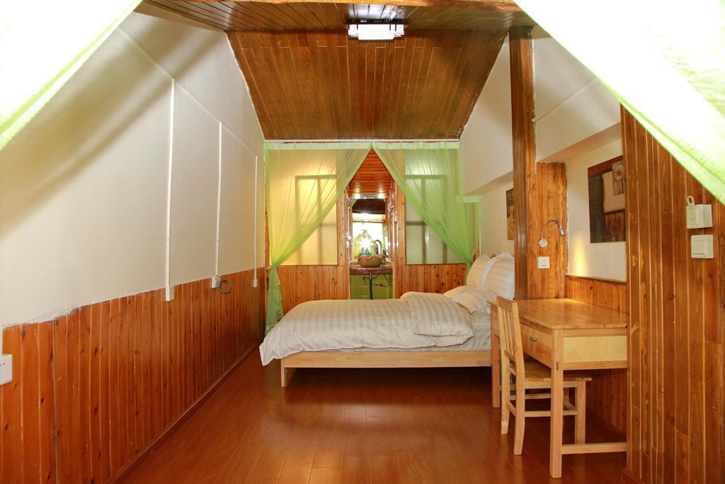 Runtong International Youth Hostel Лиджанг Стая снимка