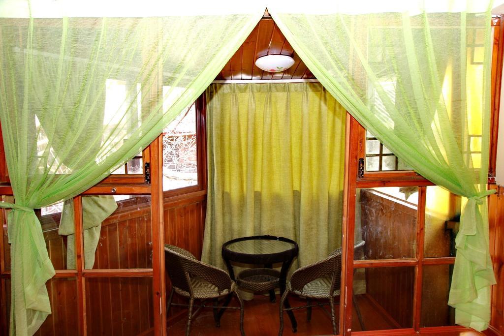 Runtong International Youth Hostel Лиджанг Стая снимка