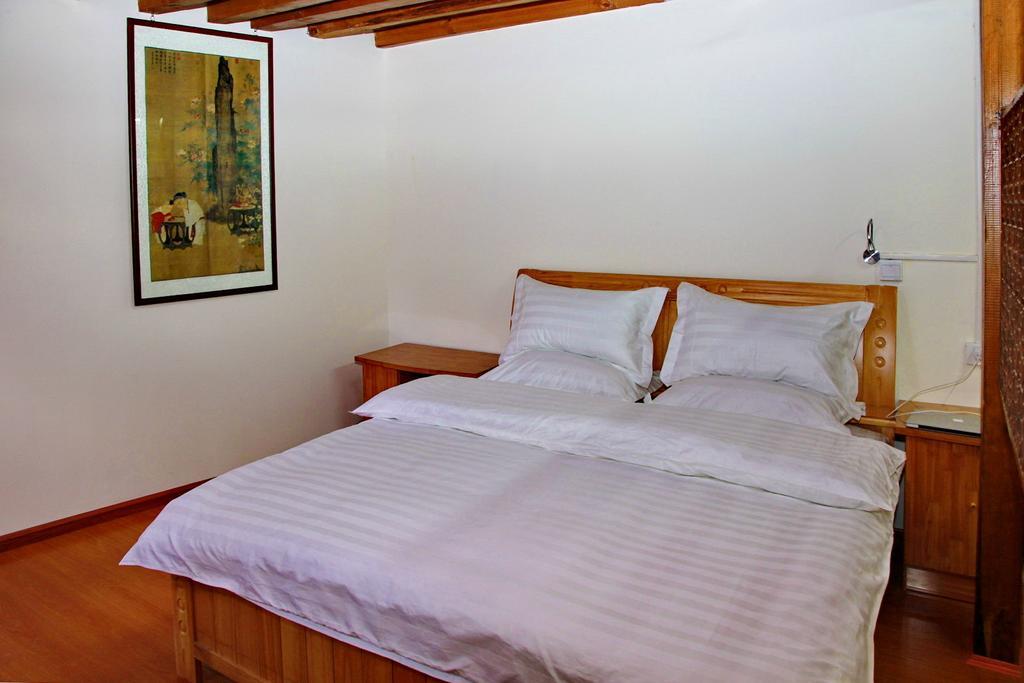 Runtong International Youth Hostel Лиджанг Стая снимка