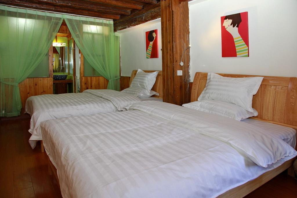 Runtong International Youth Hostel Лиджанг Стая снимка